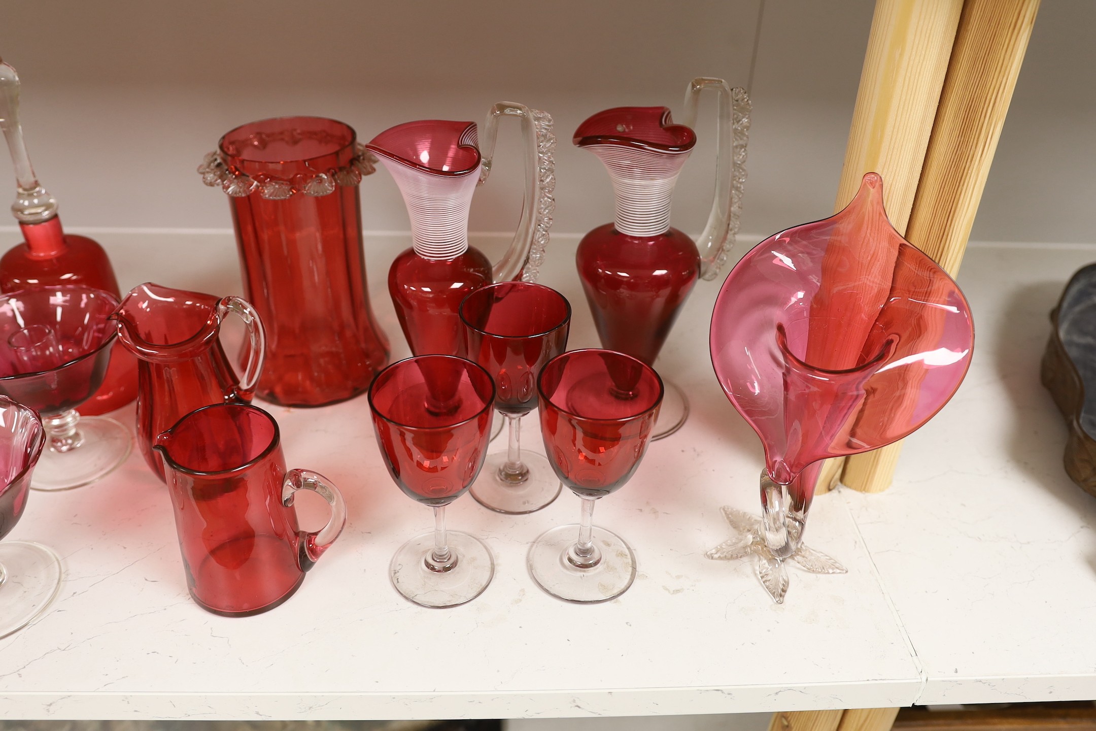 A quantity of various late 19th/early 20th century cranberry glass